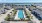pool in the middle of apartment complexes
