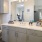 a bathroom with a large mirror