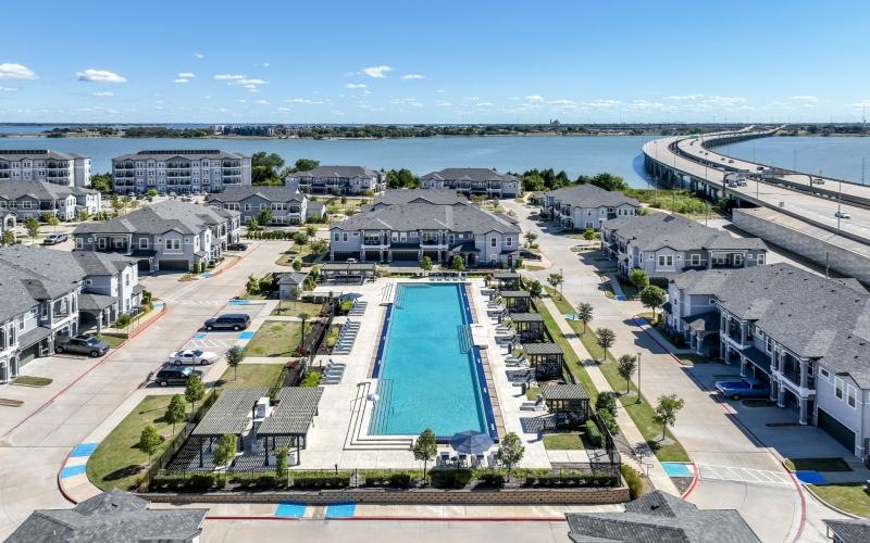pool in the middle of apartment complexes