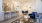 open living room adjacent to kitchen